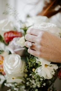 stunning photo of an engagement ring at an engagement shoot for a bride at chateau joli venue