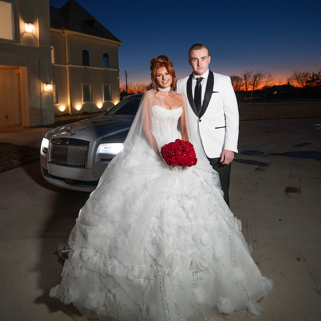 beautiful janurary wedding at chateau joli venue at sunset with an elegant vintage car waiting to take them off. 