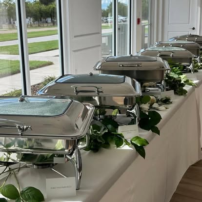 Buffet style wedding dinner with a variety of dishes served at chateau joli venue, May I Serve U set up, buffet wedding dinner